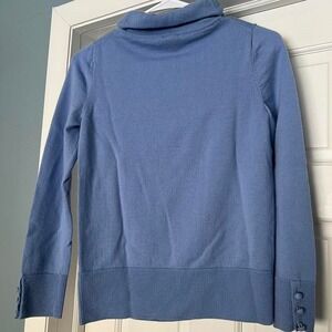 Blue 100% merino wool turtleneck sweater with button details